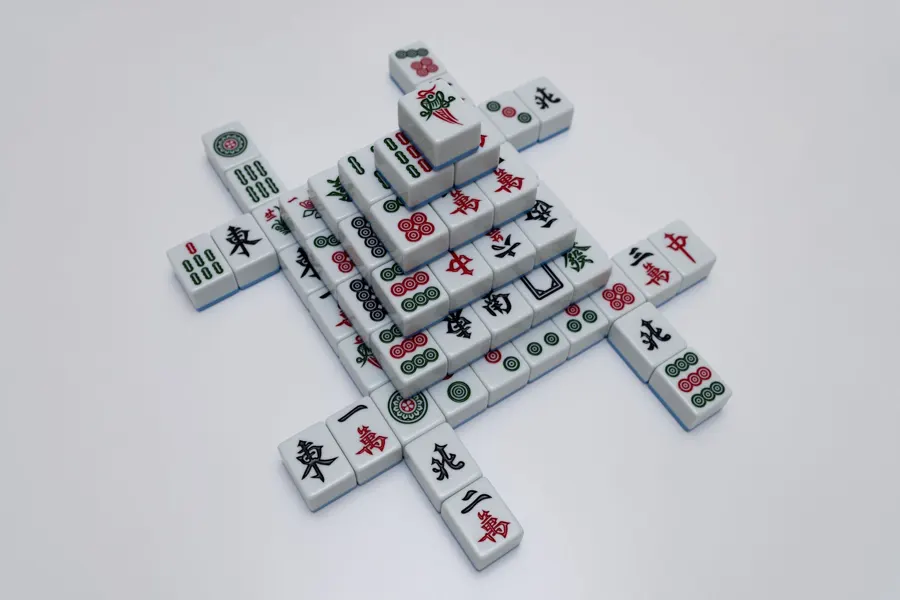 Mahjong tiles stacked in a small pyramid